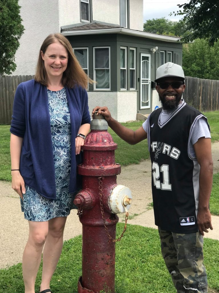 WCNO outreach coordinators posing near a fire hydrant